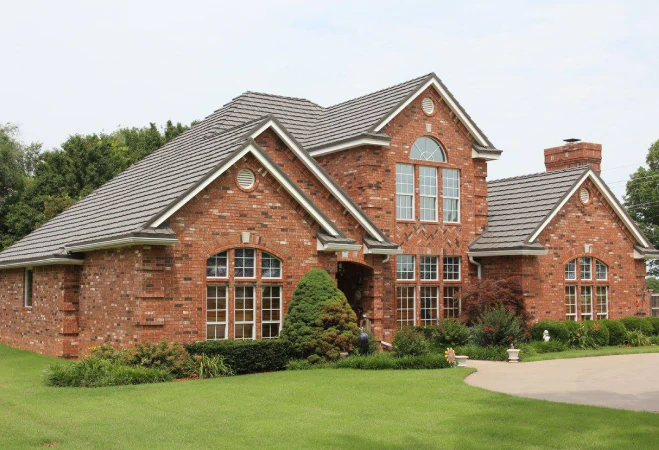 brick house with metal roof